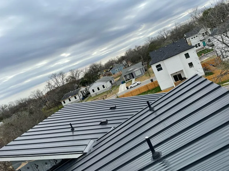 Standing seam metal roof panels with vents for Skylight Repair in St. Matthews